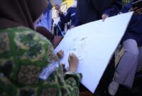 Siswa SMAN 1 Sedayu memberikan penilaian kepada salah satu karya iklan mahasiswa Ilmu Komunikasi UMY